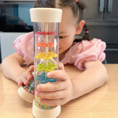 Bâton de pluie éveil sensoriel — stimulation auditive bébé Montessori